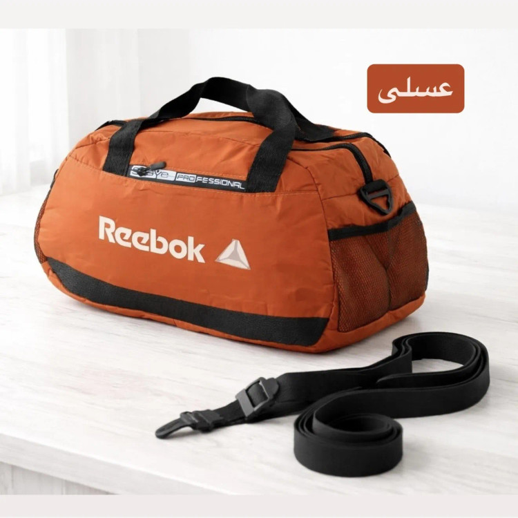 ساک ورزشی پارچه ای ابعاد 45 در 25 در 15 سانتیمتر با بند بلند و زیپ